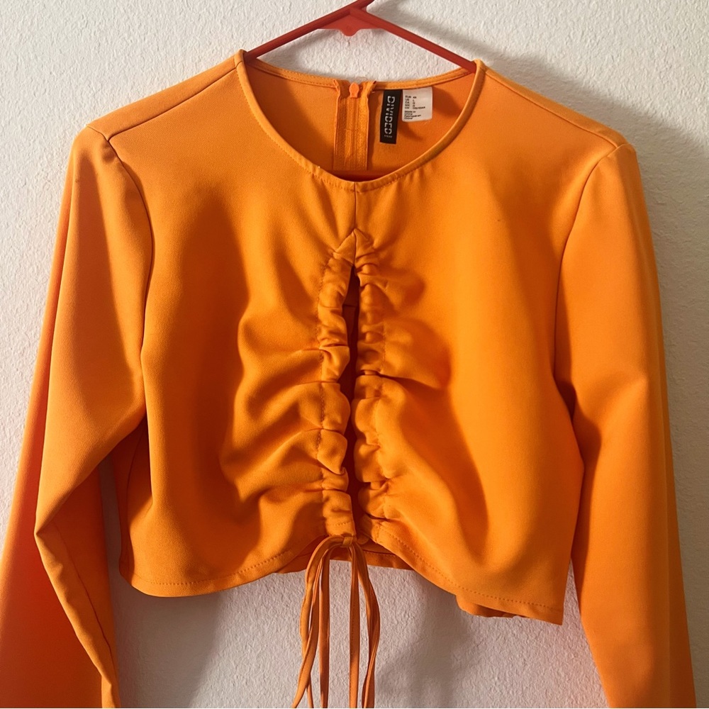 2/$15💖H&M Divided Orange Cut Out Blouse
